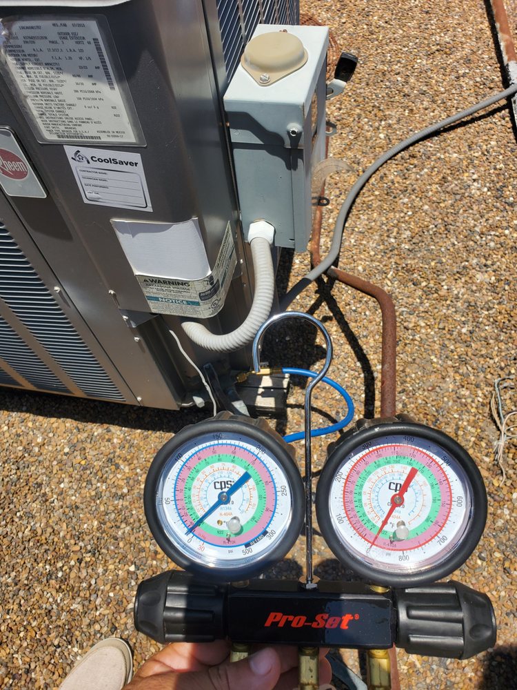 Electro Cooling Service electrician performing electrical and HVAC work in Edinburg, TX